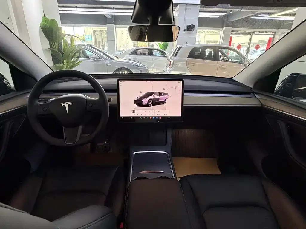 Tesla Model Y — фото 6