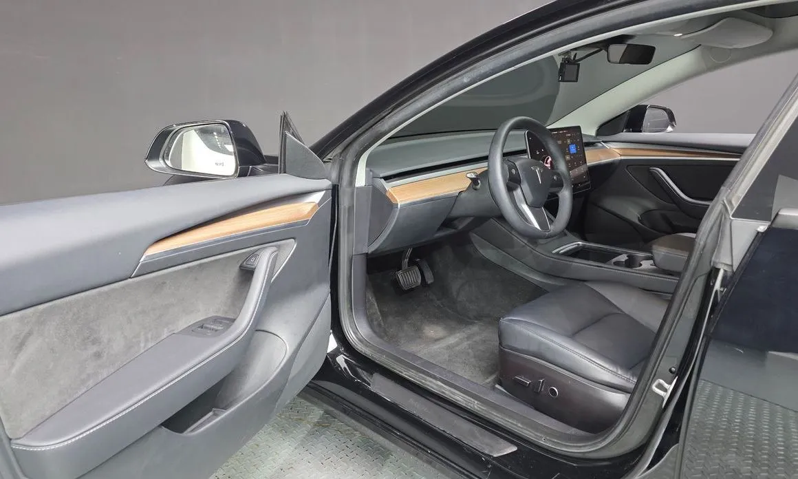 Tesla Model 3 — фото 10