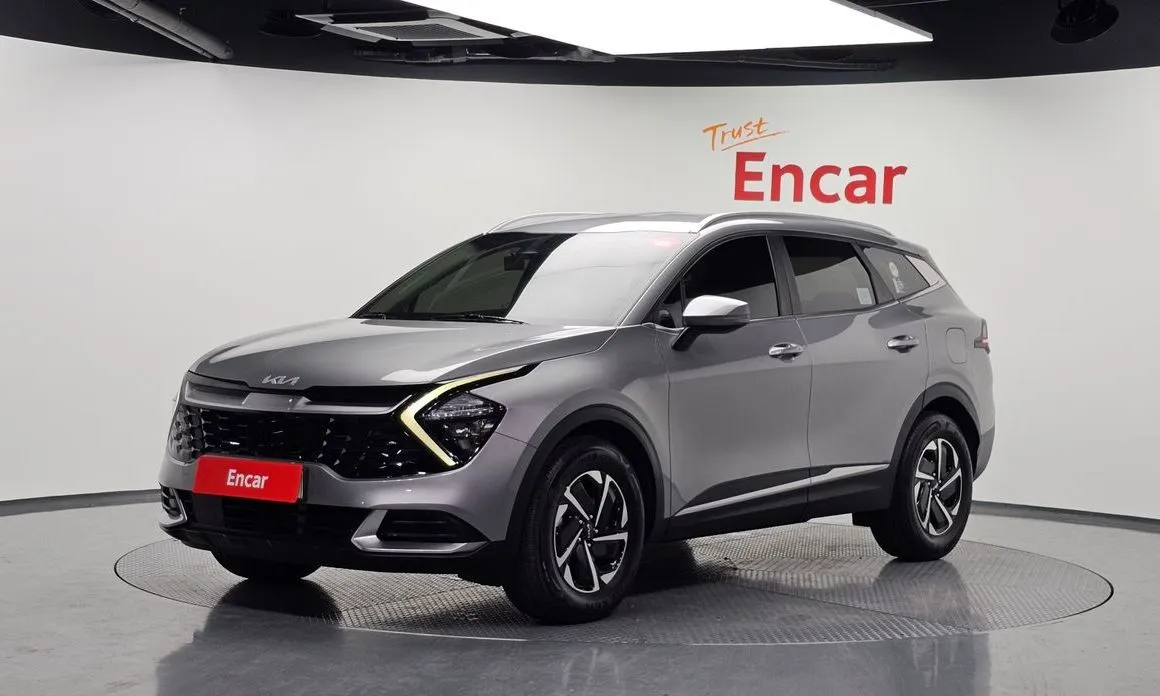 Kia Sportage — фото 1