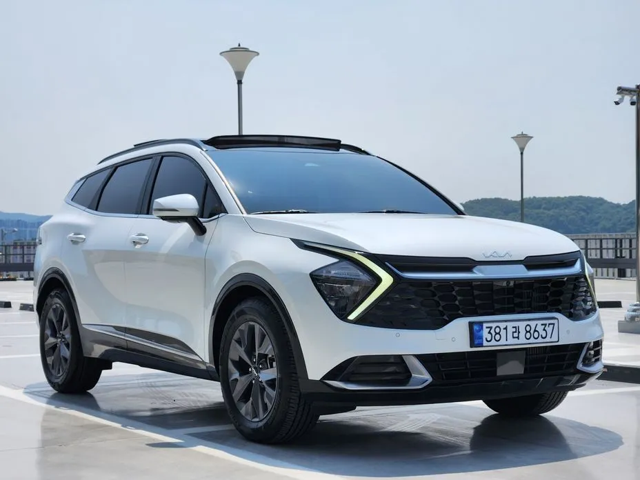 Kia Sportage — фото 9