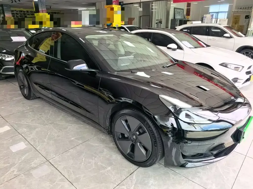 Tesla Model 3 — фото 10