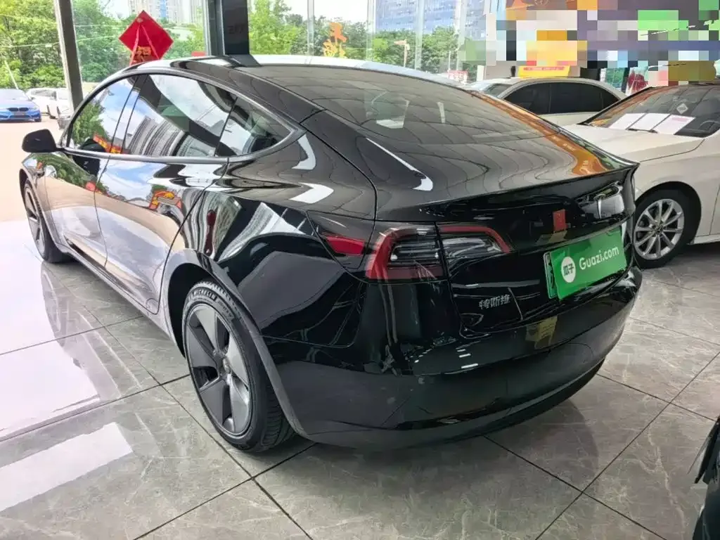 Tesla Model 3 — фото 7