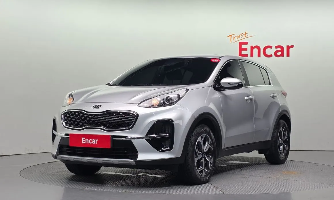 Kia Sportage — фото 1