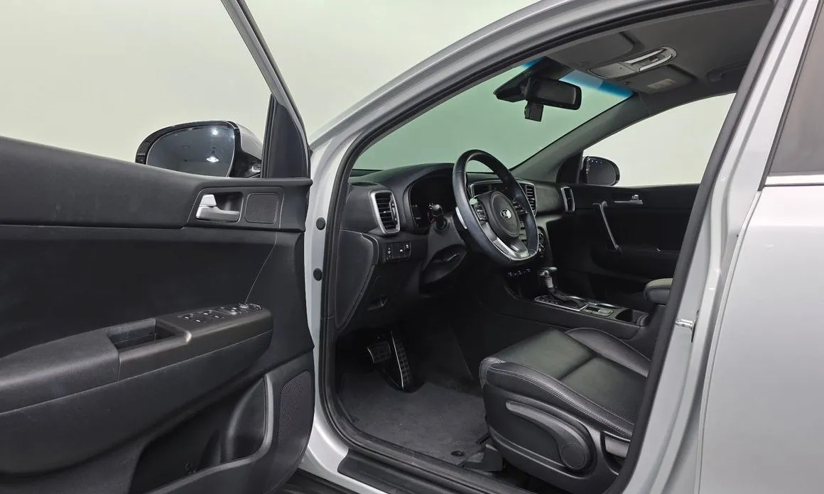 Kia Sportage — фото 8