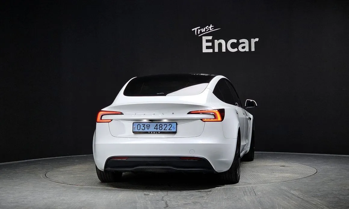 Tesla Model 3 — фото 7