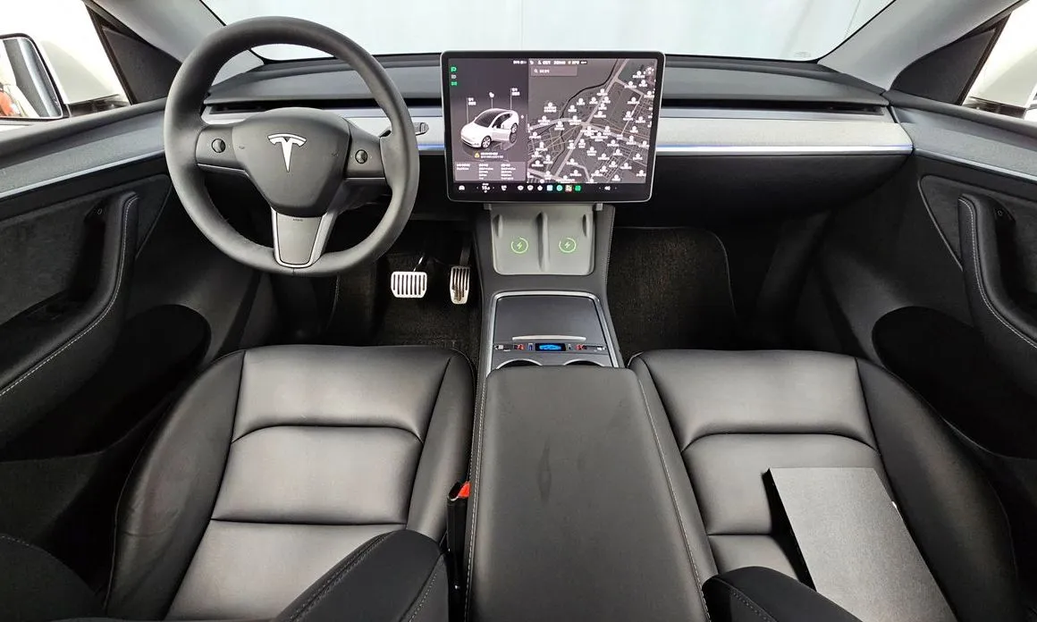 Tesla Model Y — фото 9