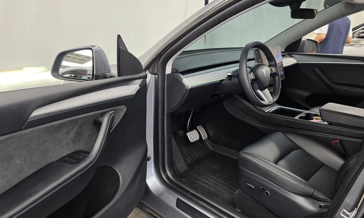 Tesla Model Y — фото 9