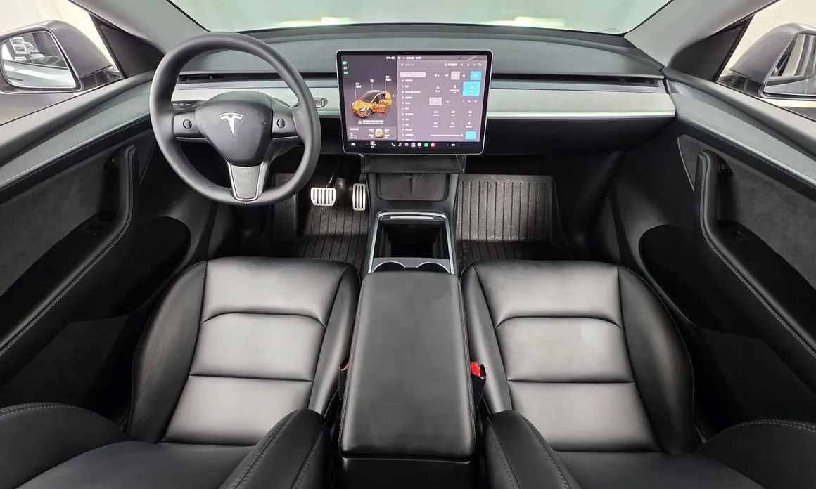 Tesla Model Y — фото 7