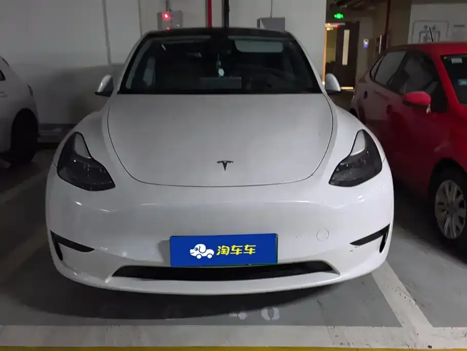 Tesla Model Y — фото 6