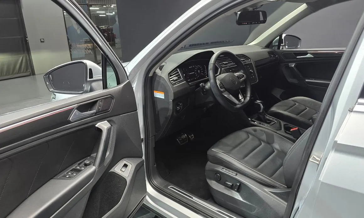 Volkswagen Tiguan — фото 8