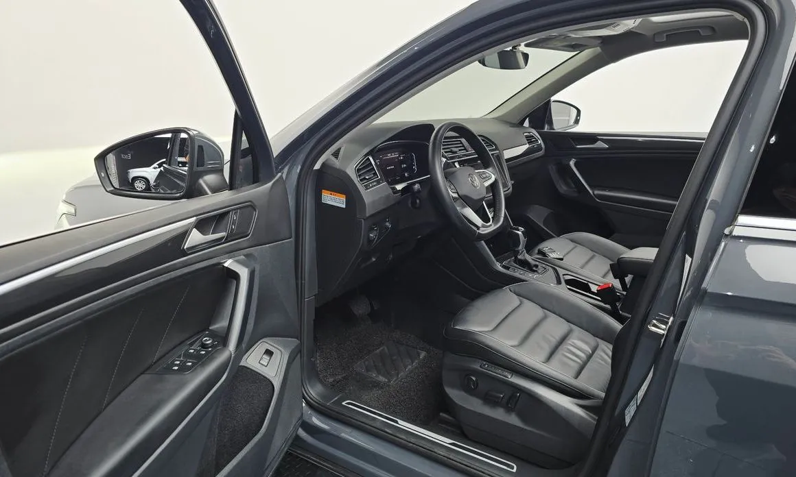 Volkswagen Tiguan — фото 8