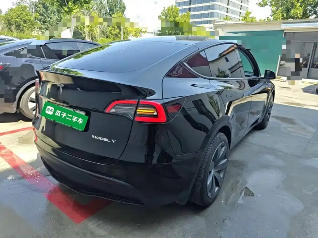 Tesla Model Y — фото 7