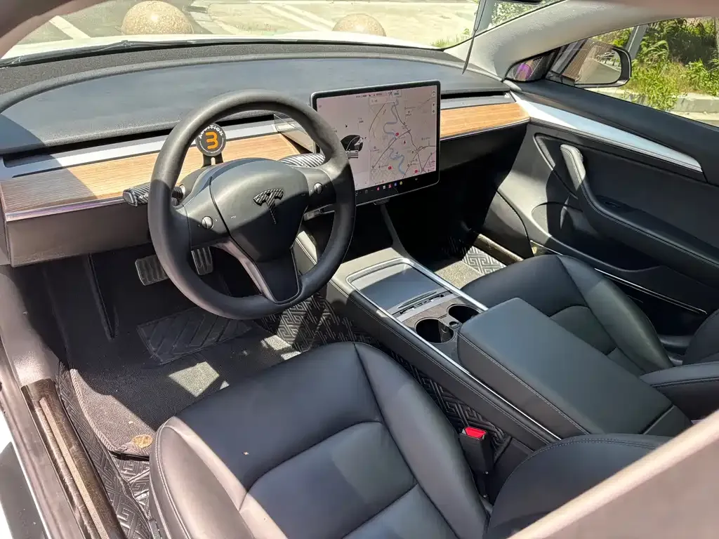Tesla Model 3 — фото 7