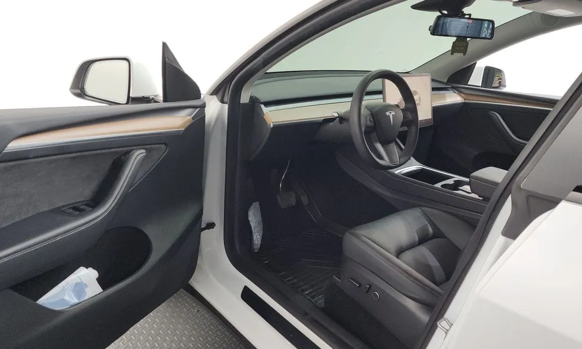 Tesla Model Y — фото 7