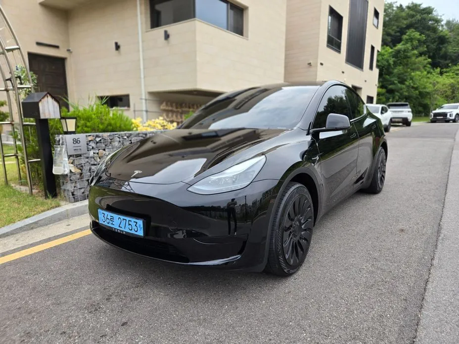 Tesla Model Y — фото 1