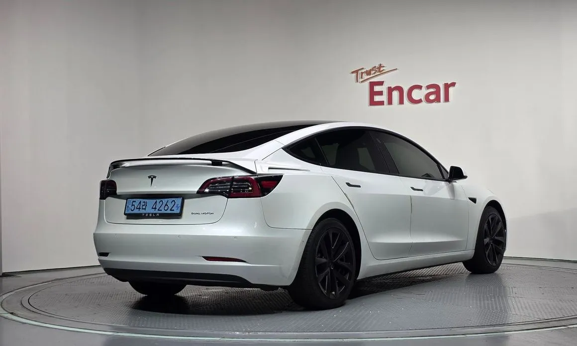 Tesla Model 3 — фото 9