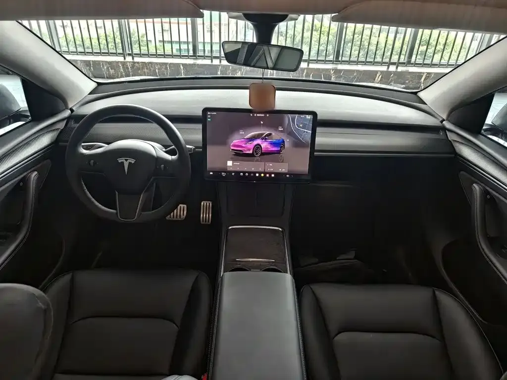 Tesla Model Y — фото 10