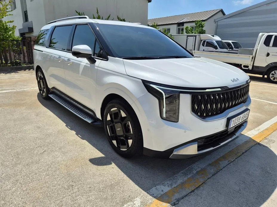 Kia Carnival — фото 10