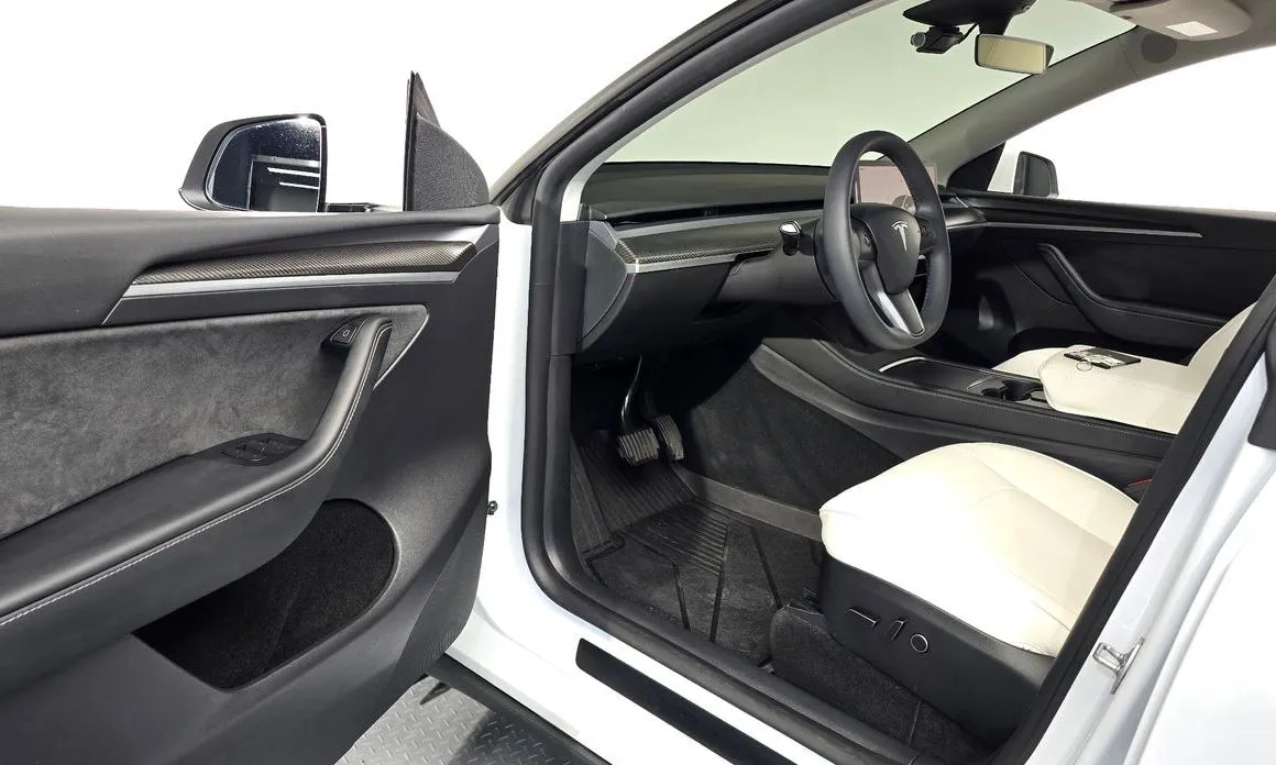 Tesla Model Y — фото 8