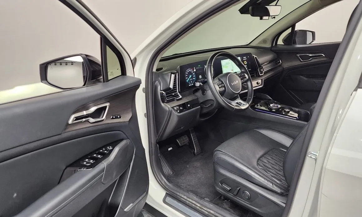 Kia Sportage — фото 8