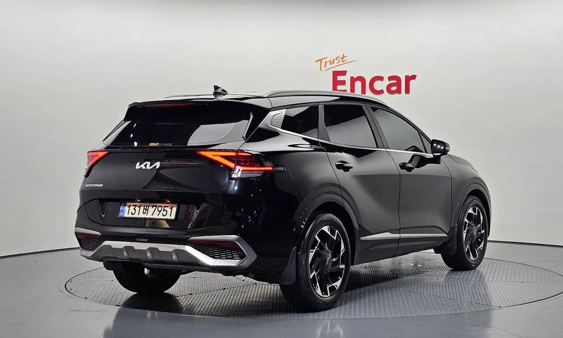 Kia Sportage — фото 10