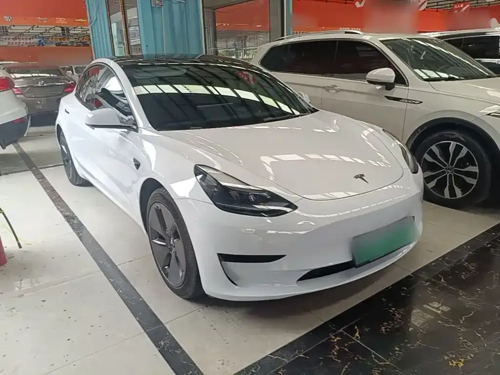 Tesla Model 3 — фото 10