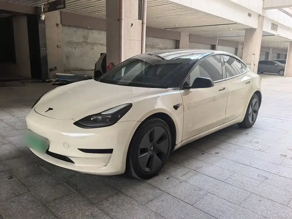Tesla Model 3 — фото 10