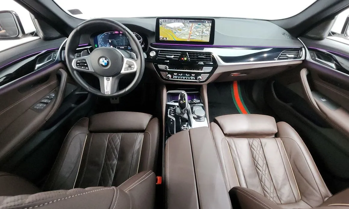 BMW 5-Series — фото 10