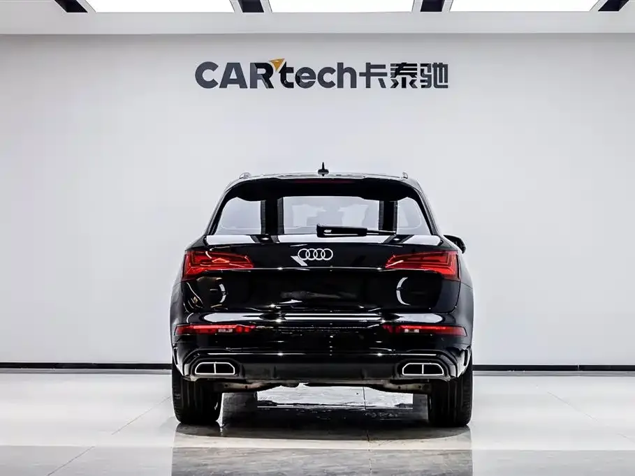 Audi Q5L — фото 10