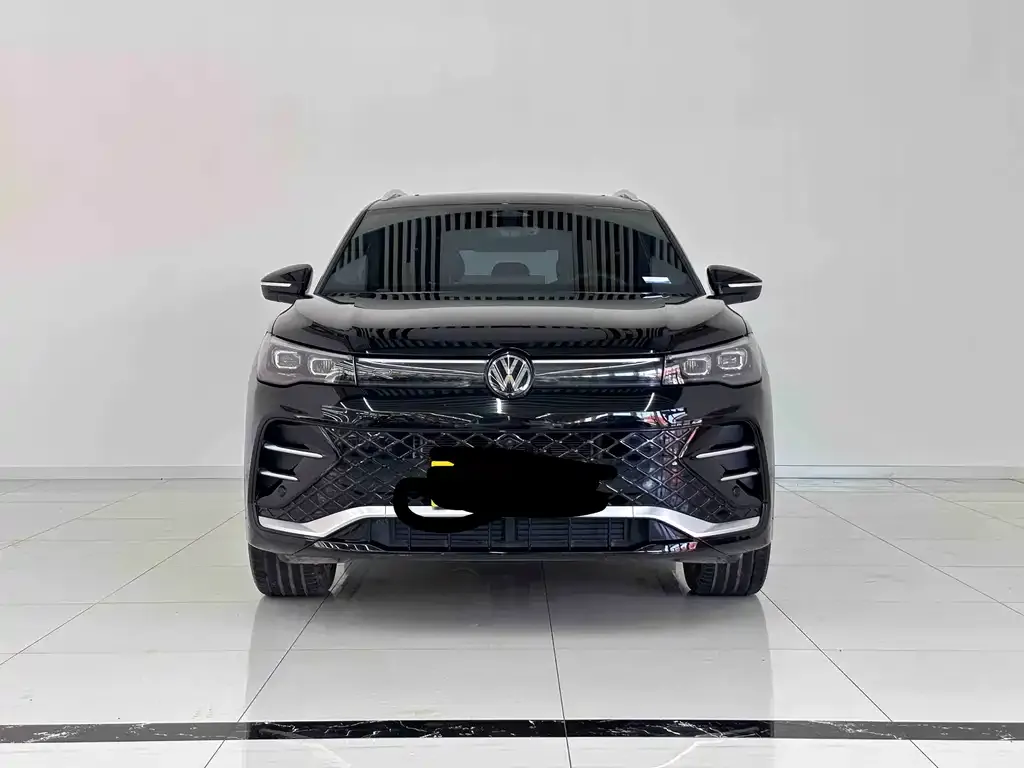 Volkswagen Tiguan L — фото 4