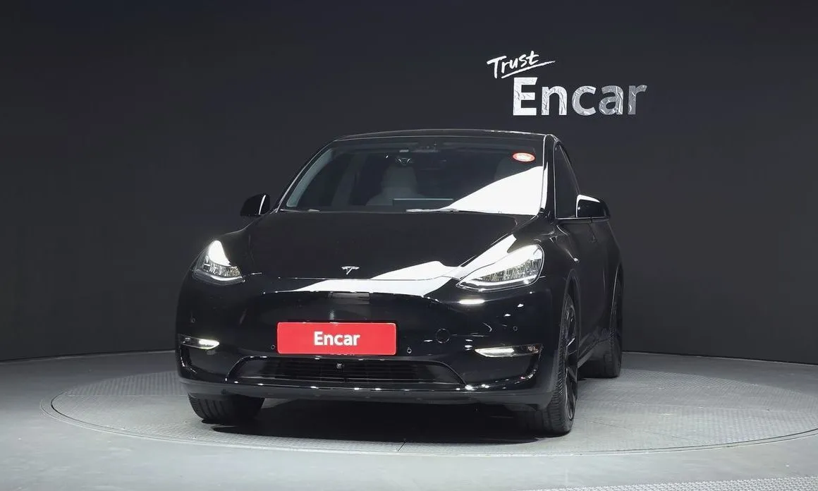 Tesla Model Y — фото 9