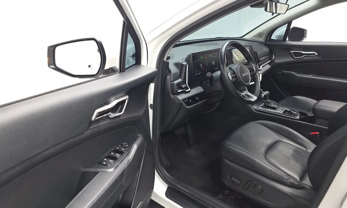 Kia Sportage — фото 10
