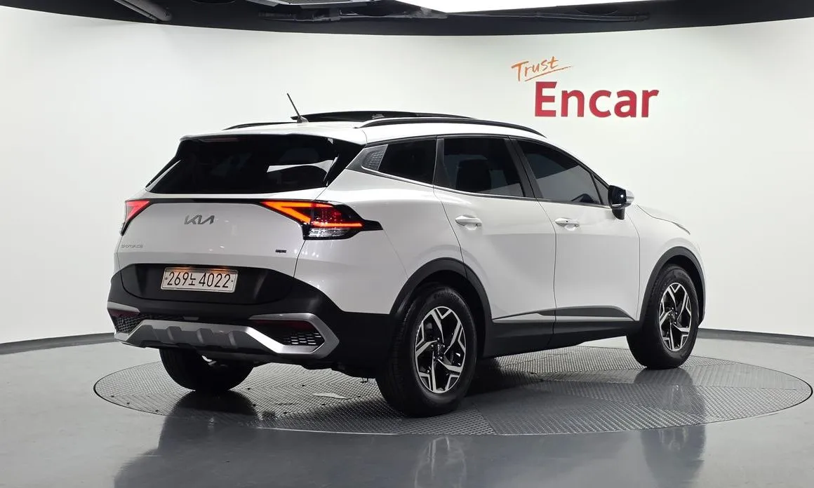 Kia Sportage — фото 7