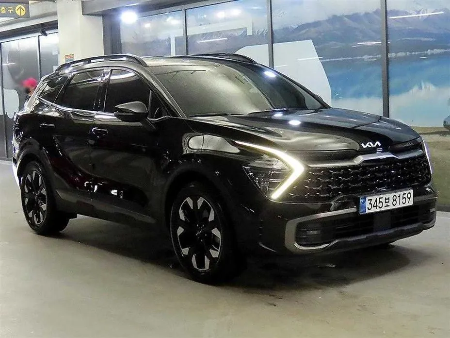 Kia Sportage — фото 1