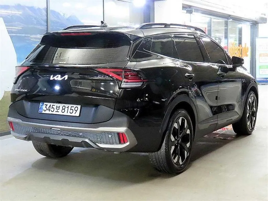 Kia Sportage — фото 7