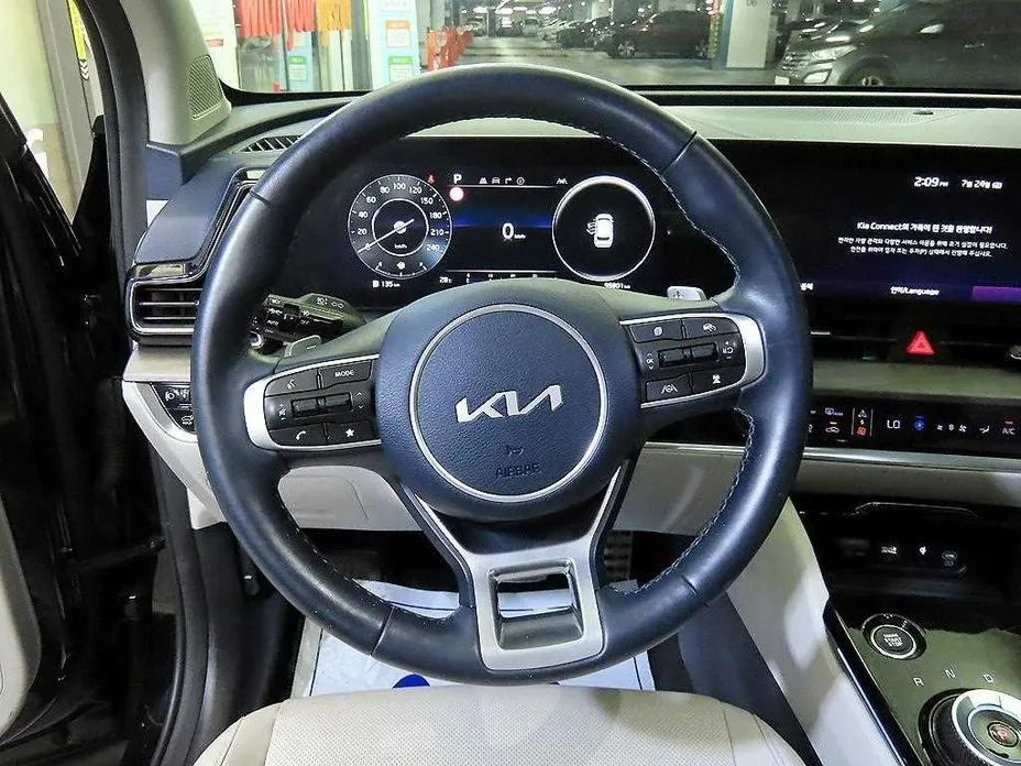 Kia Sportage — фото 9