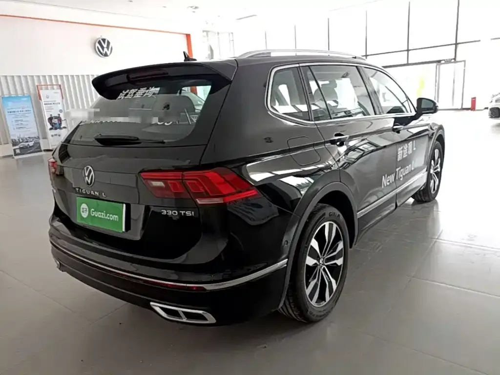 Volkswagen Tiguan L — фото 9