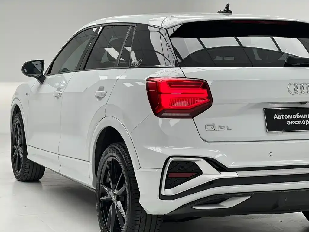 Audi Q2L — фото 10