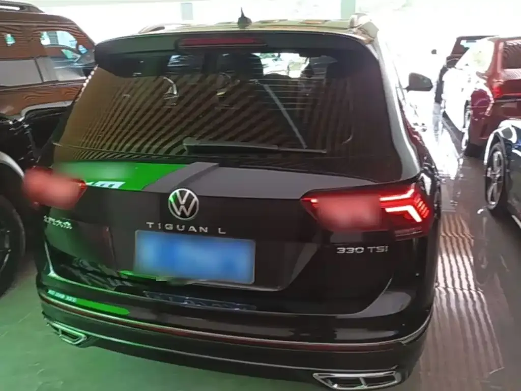 Volkswagen Tiguan L — фото 2