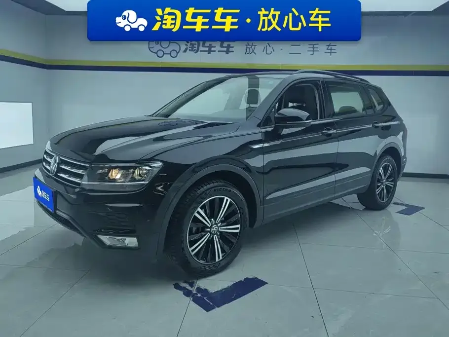 Volkswagen Tiguan L — фото 1