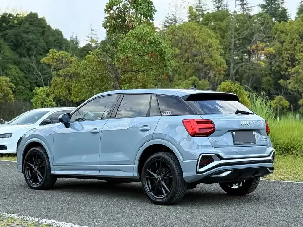 Audi Q2L — фото 10