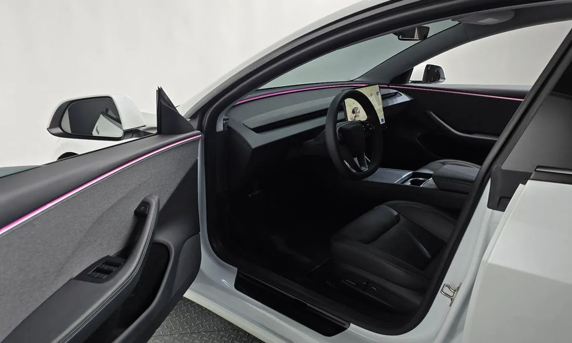 Tesla Model 3 — фото 9