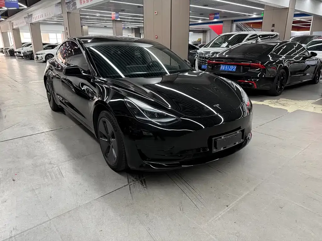 Tesla Model 3 — фото 10