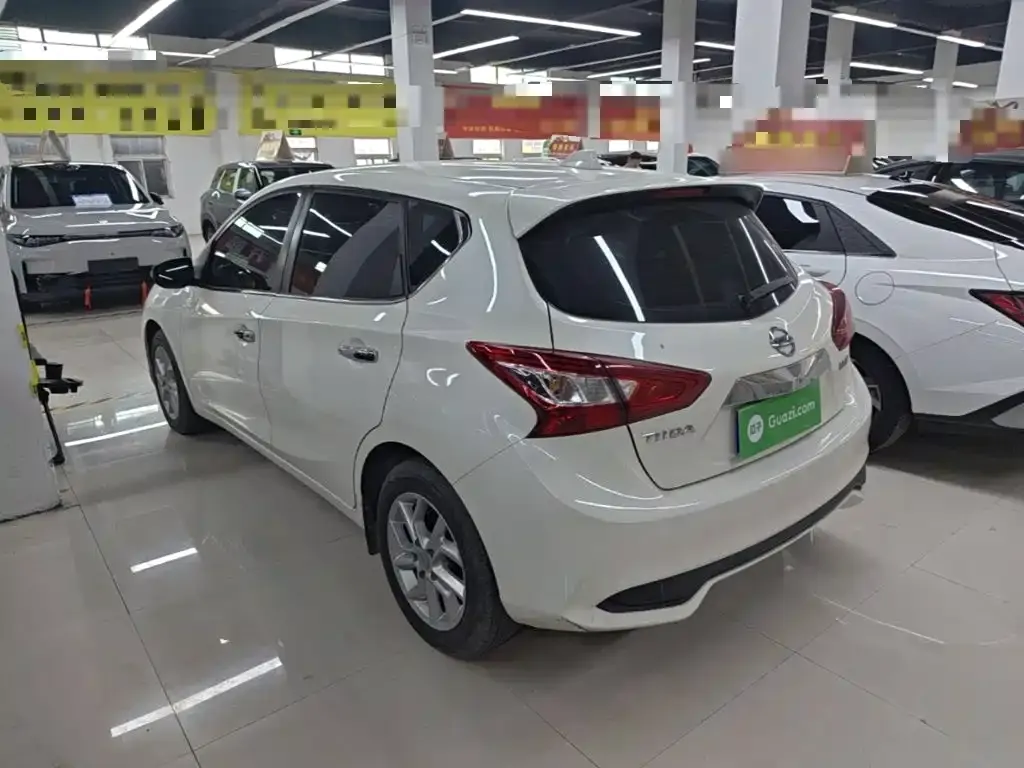 Nissan Tiida — фото 9