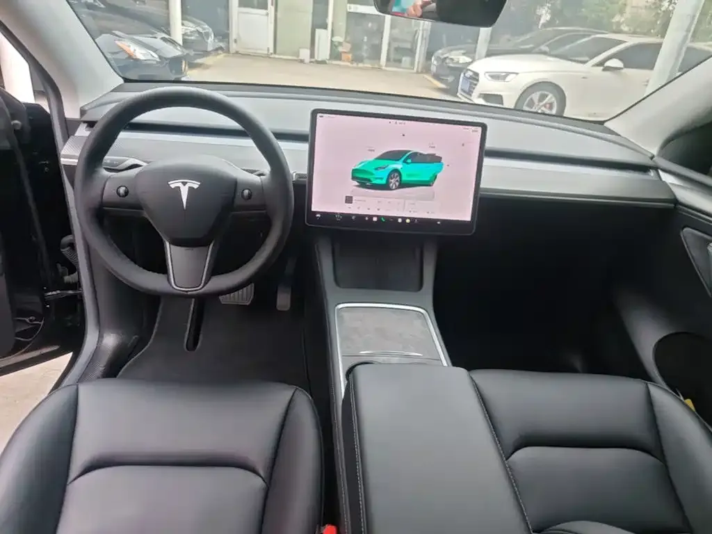 Tesla Model Y — фото 6