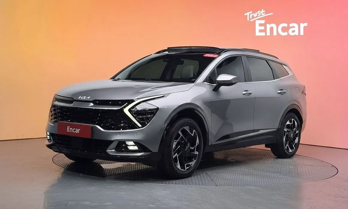 Kia Sportage — фото 1