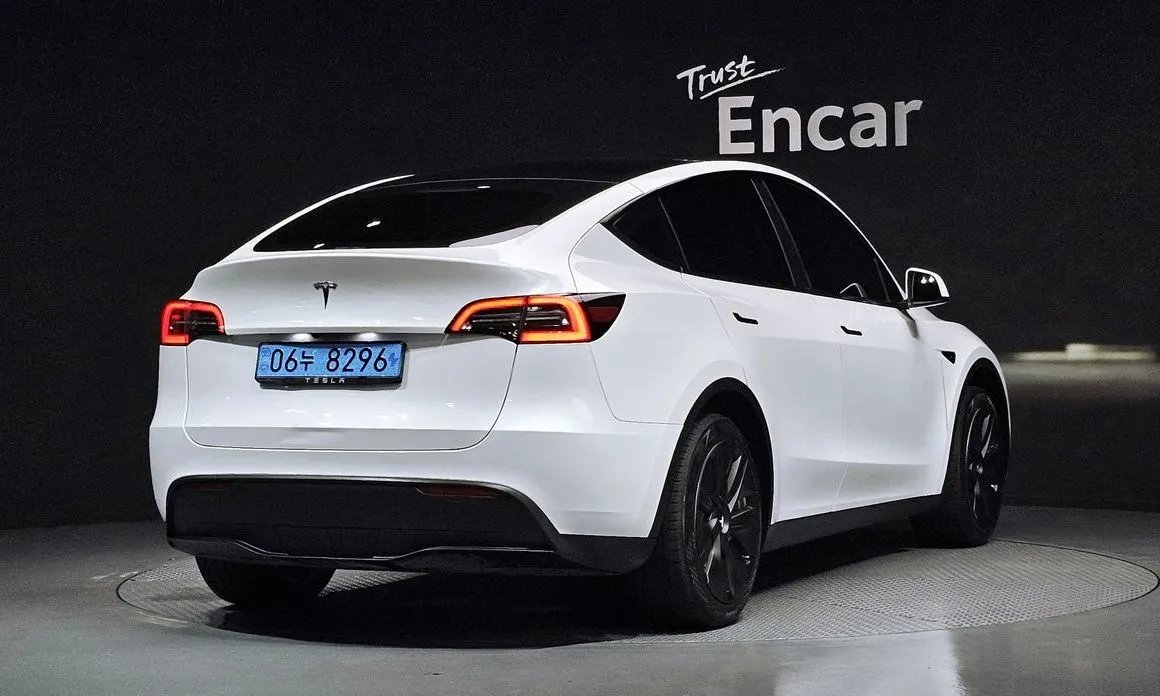 Tesla Model Y — фото 6