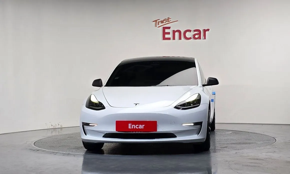 Tesla Model 3 — фото 9