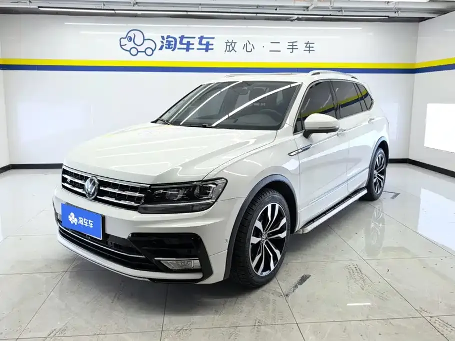 Volkswagen Tiguan L — фото 1