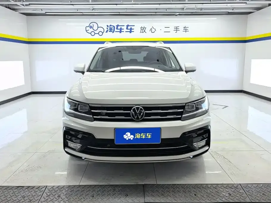 Volkswagen Tiguan L — фото 9